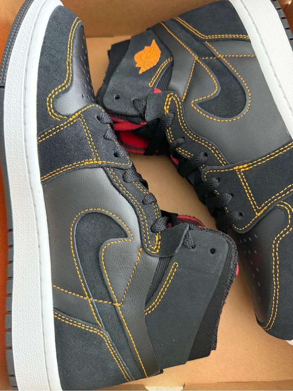 Nike Black High-Top Sneakers with Orange Stitching